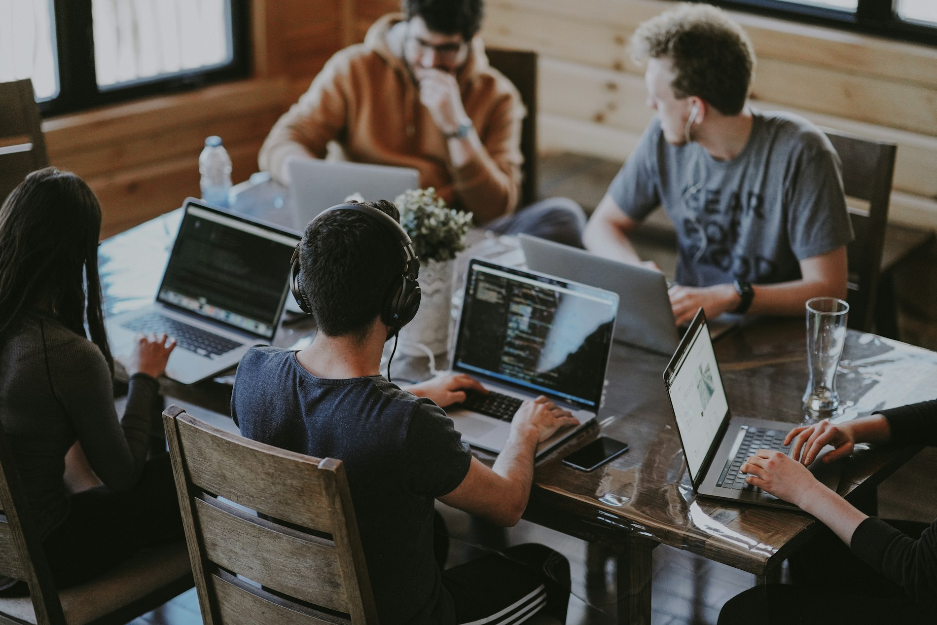 A diverse team collaborating in a bright modern office